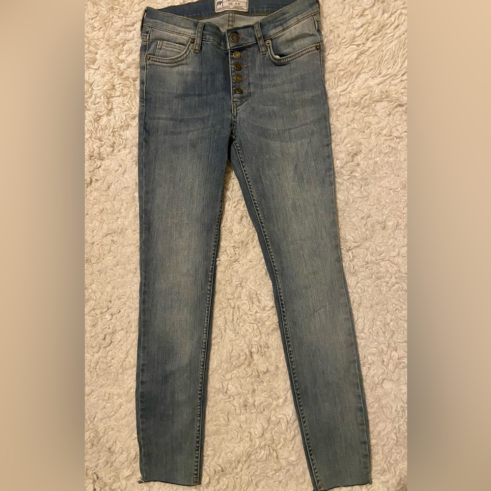 Free People size 26 button fly, skinny jeans with frayed hem